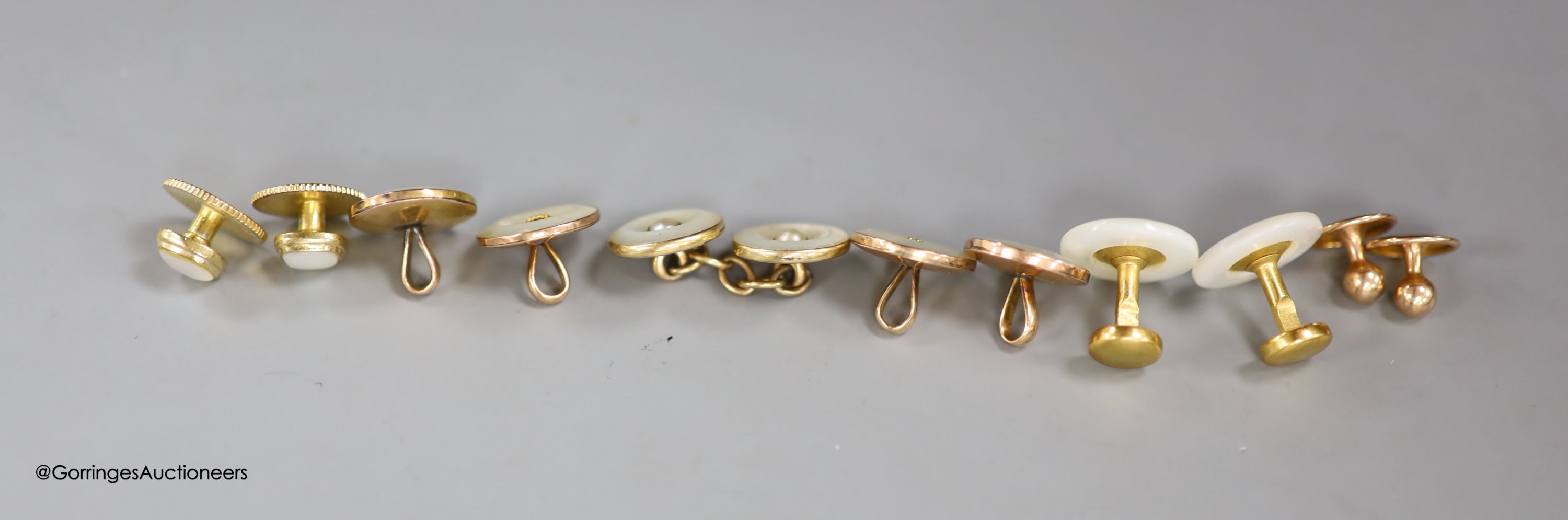 A small collection of assorted dress studs and buttons and cufflink, two stamped 9ct (1.1. grams).